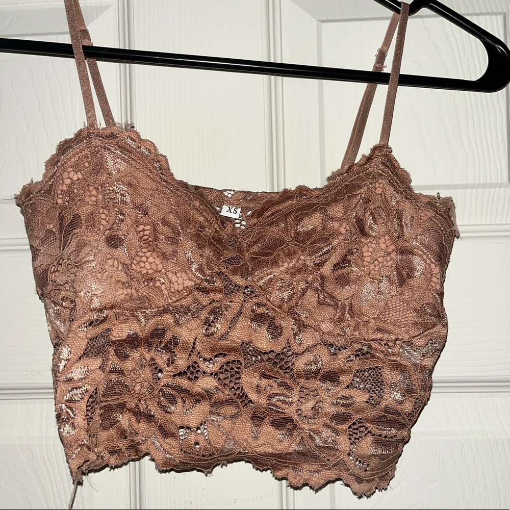 This is a laced crop top. This top has only been worn once.